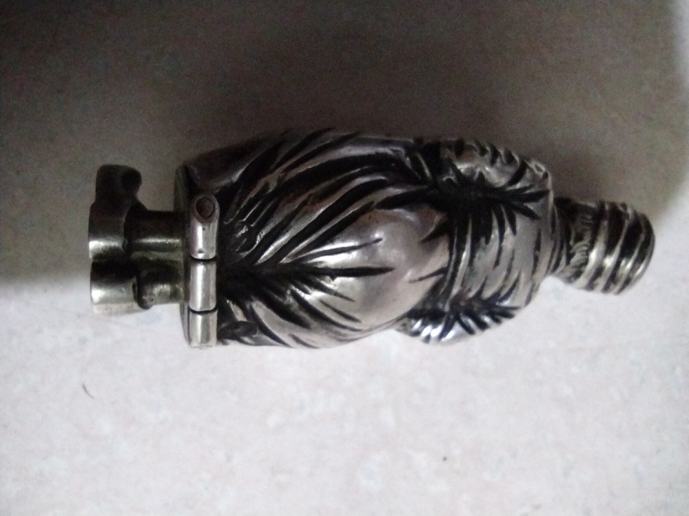 Antique salt or pepper shaker. Solid silver, dated around 1900. No dings.