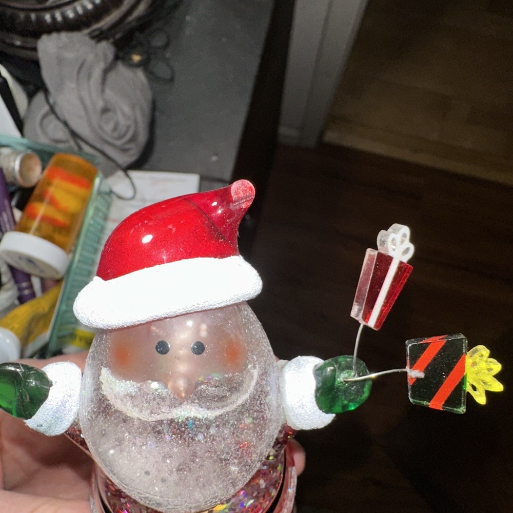 Santa night light with Jingles over his head