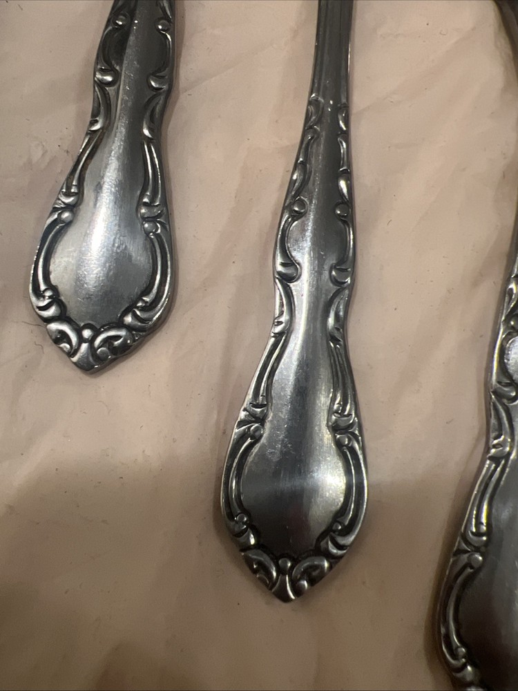 Oneida Northland Sirocco Mixed Stainless flatware 28 pc Set Jasmine Scroll