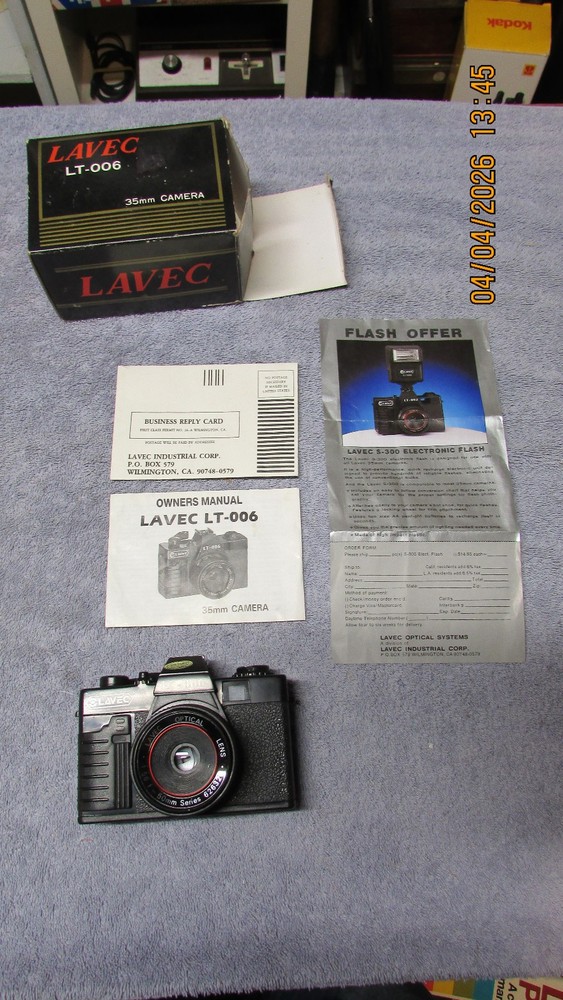 3 vintage cameras.