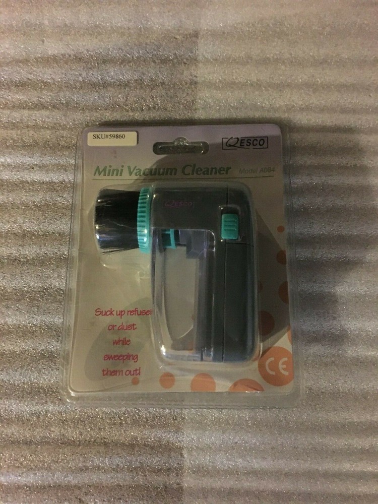 Qesco Model A084 Mini Vacuum Cleaner