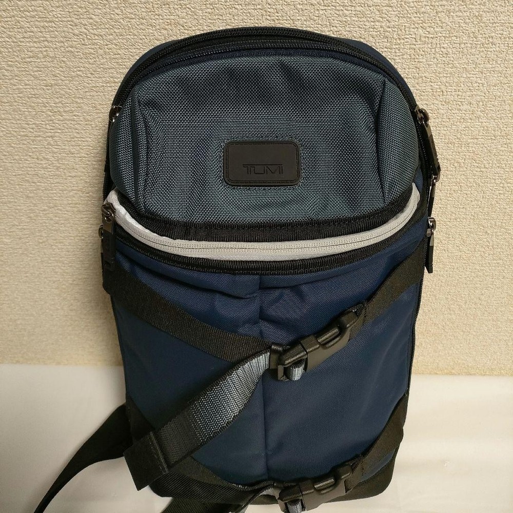 TUMI body bag slingback