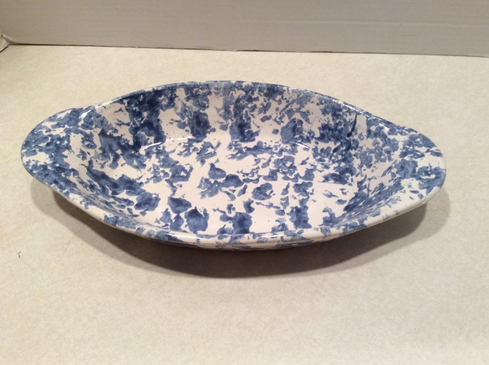 Oval blue spackled pottery dish, handcrafted