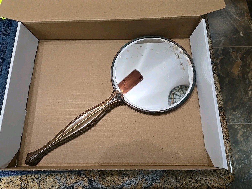 vintage hand-held vanity mirror