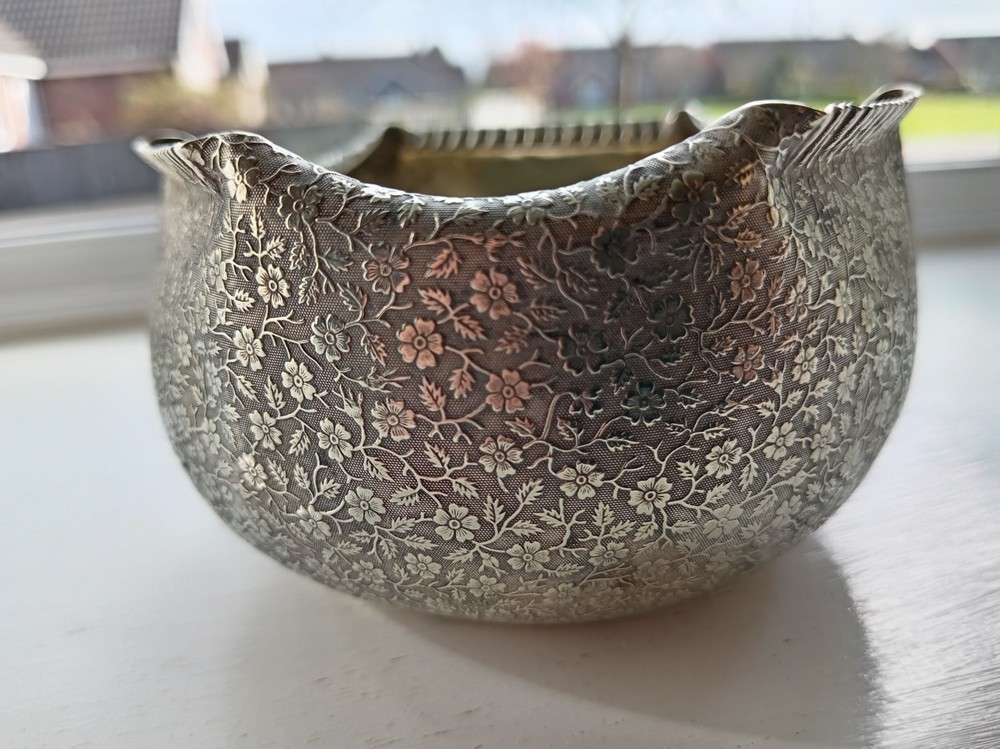 Silver plated very ornate rose bowl.