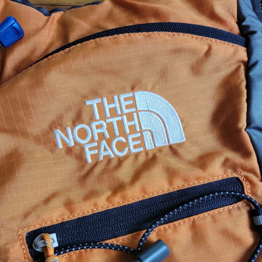 The North Face Flight Series Hydration Pack Orange Gray No Bladder