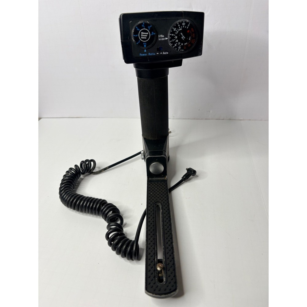 Sunpak Auto 511 Thyristor Handle Mount Flash with Bracket and Sync Cord Black