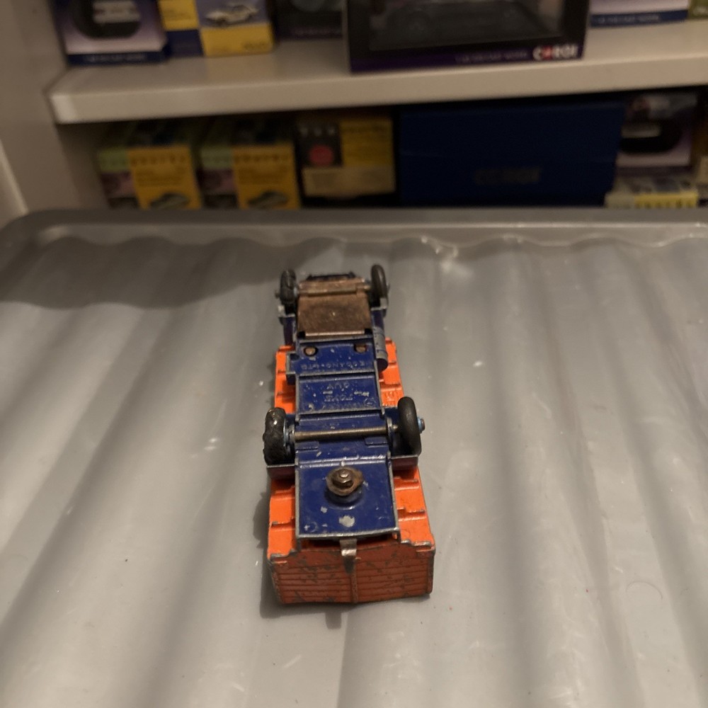 DINKY GUY FLATBED with tailboard 1950s. orange & blue
