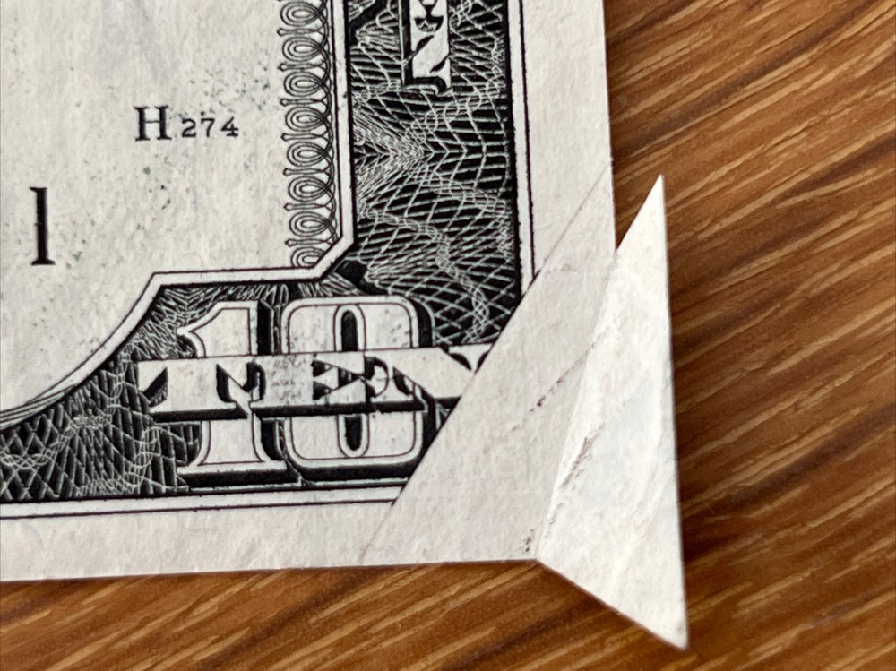 misprint and cut dollar bill