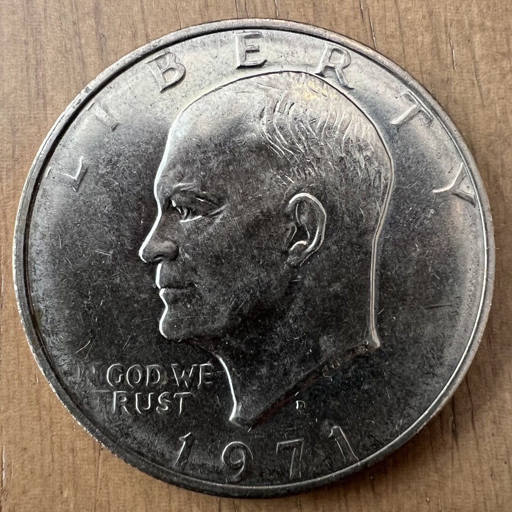 1971 D  Eisenhower Dollar Struck Through Grease mint error on obverse