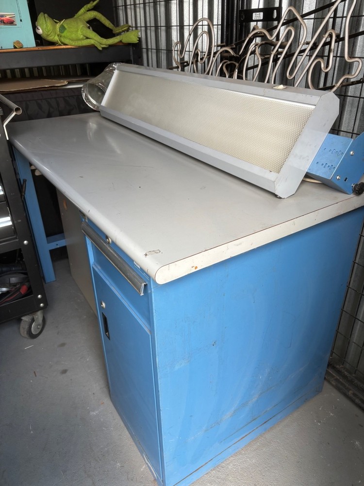 Workbench with overhead light and shelf
