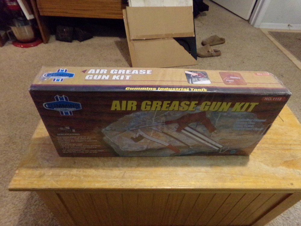 CUMMINS AIR POWERED GREASE GUN. OPEN BOX.