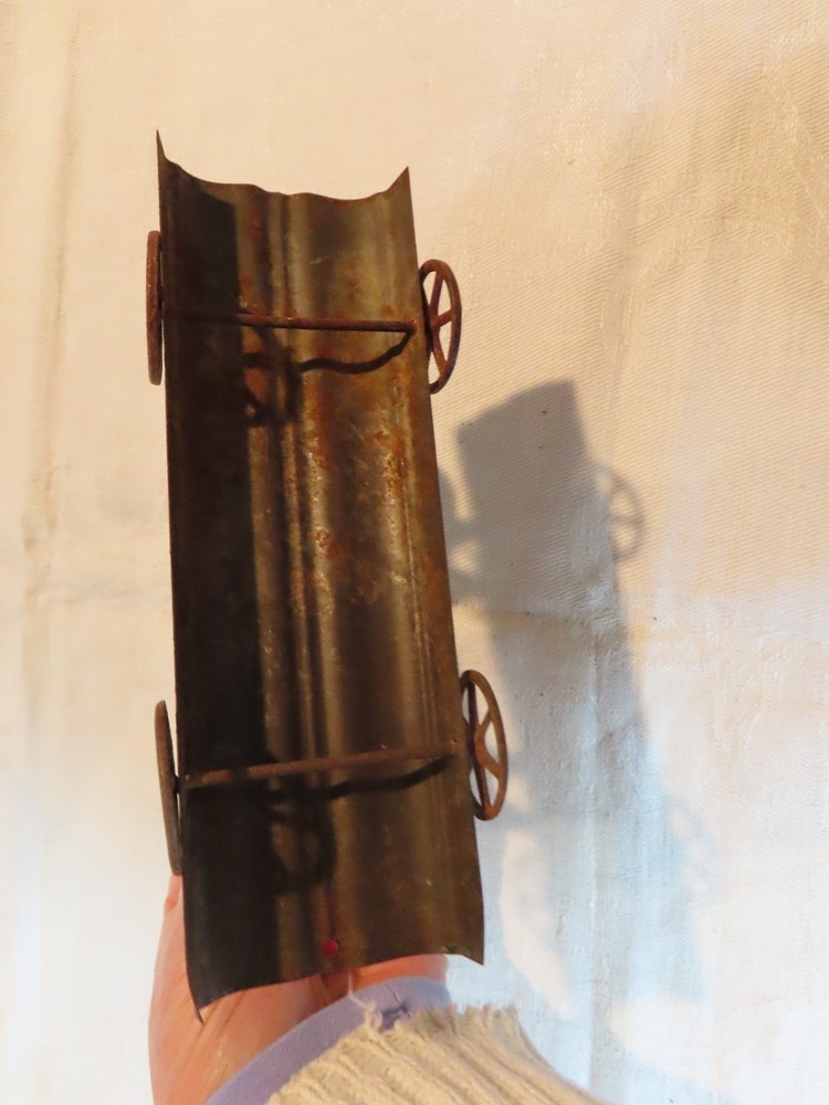 Antique tin dog pull toy