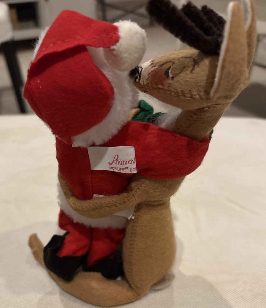 Analee Reindeer hugging Santa