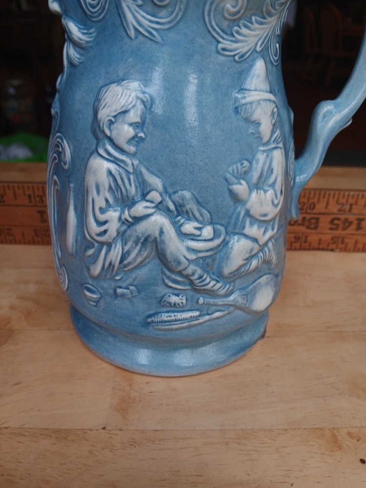 vtg relief molded earthenware pitcher "The Idle Apprentices". 588