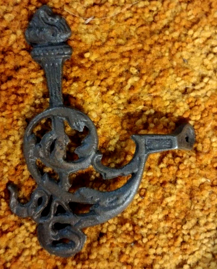 ANTIQUE CAST IRON (4) COAT TREE HOOKS WITH TORCHES ORNATE