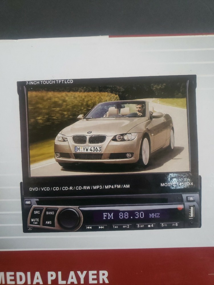 Auto multimedia player. New open box. 7" touch screen. See description