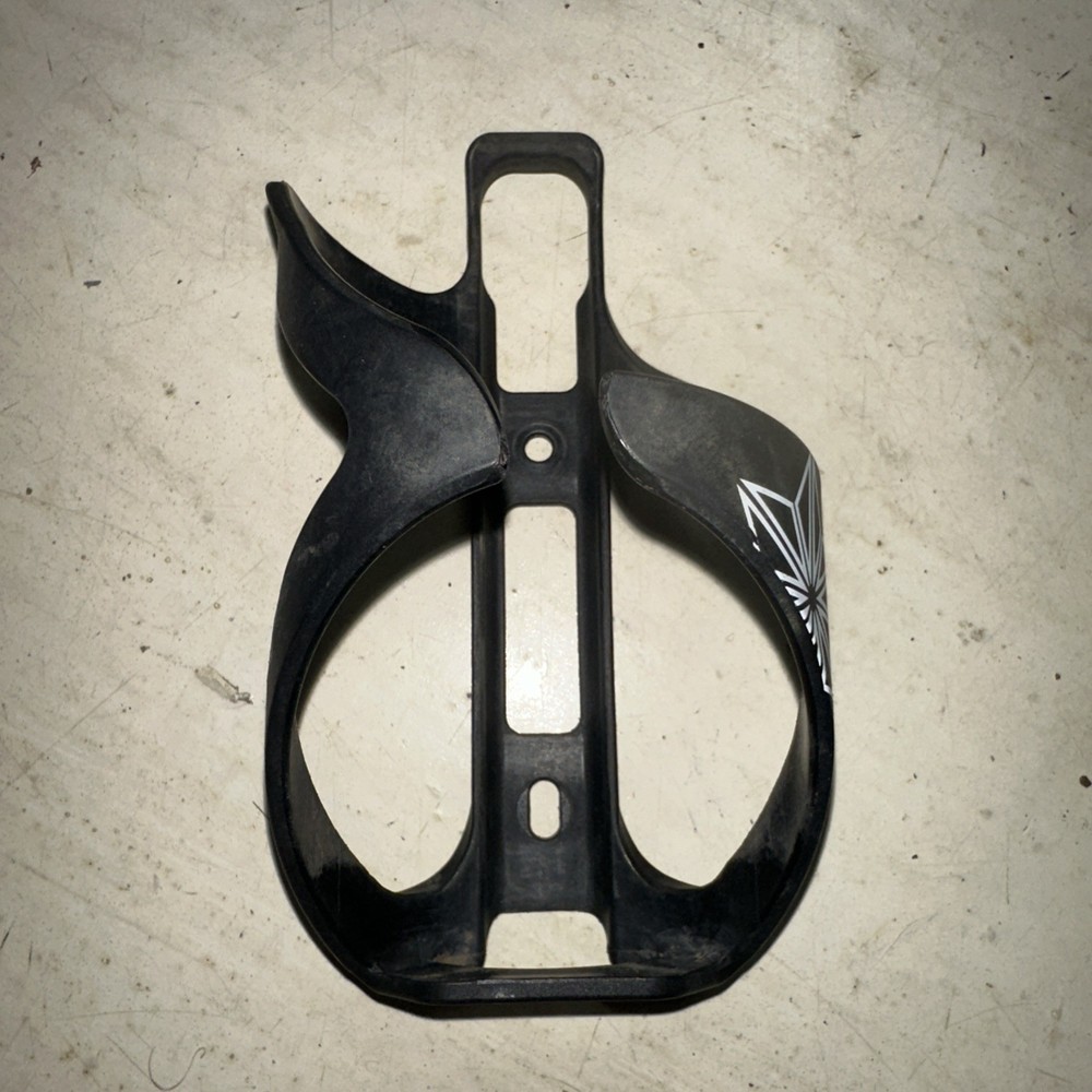 Supacaz Tron Poly Bottle Cage Black Side Loader Right Hand Load White Graphic