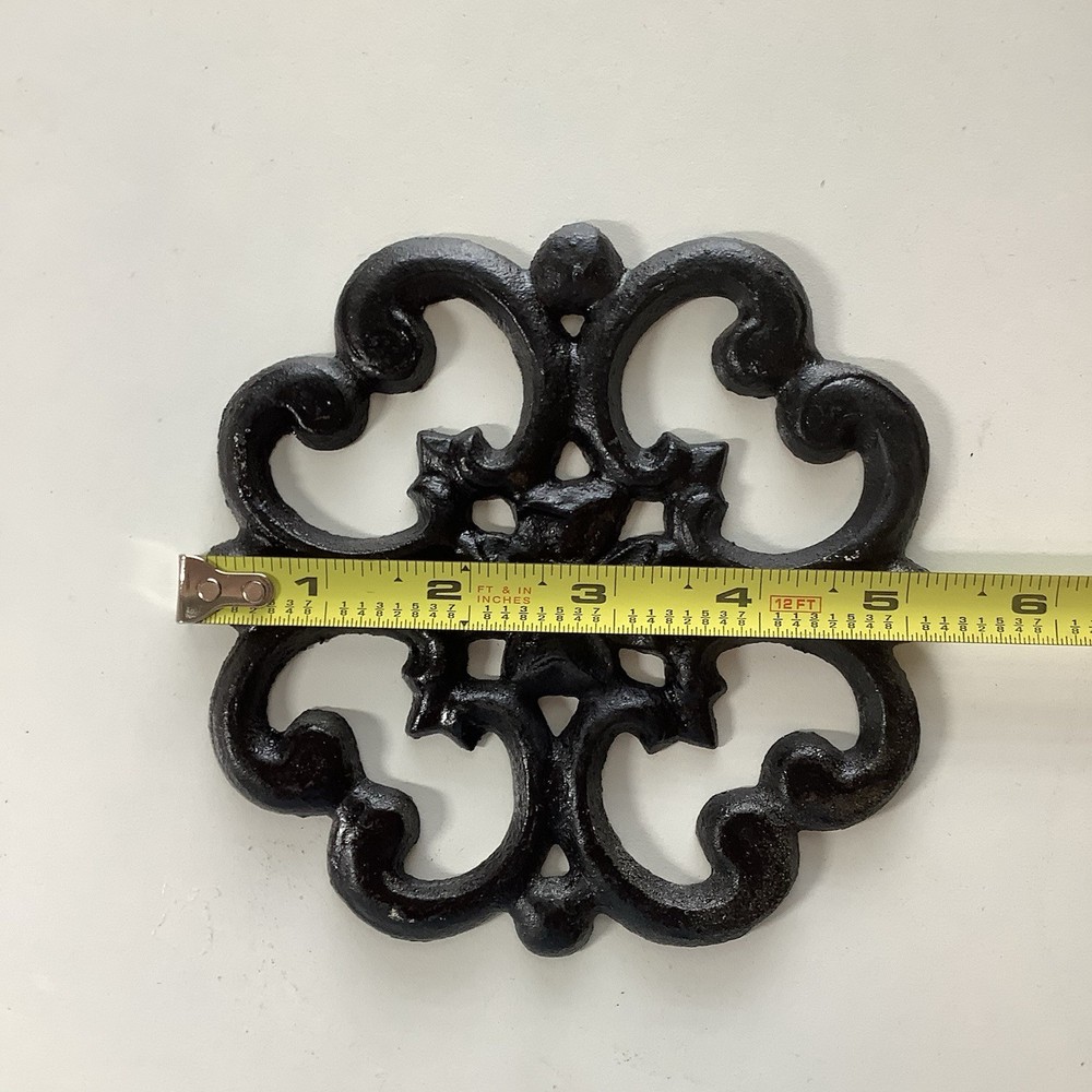 2 Decorative Cast Iron Pieces A Scrolled Rosette And A Fleur-de-lis Plaque