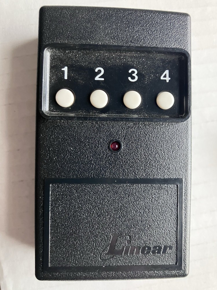 📳 OEM Linear DT-4 4 Button Remote Transmitter 310MHz 8 Dip Switch GuC Tested