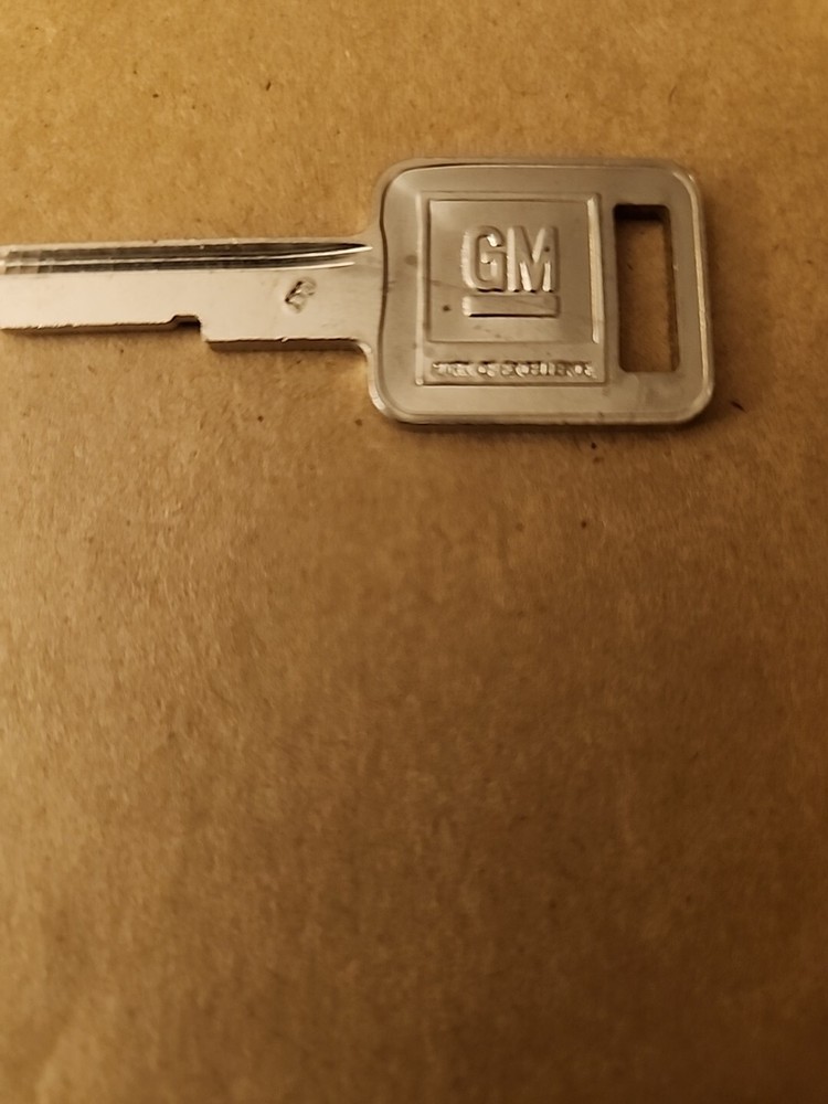 NEW GM Logo OEM Ignition "E" Blank Key Uncut #1154606