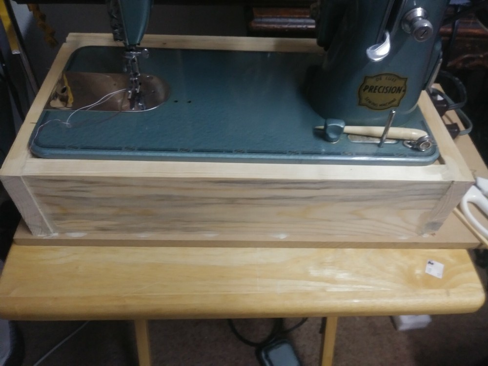 bottom base for sewing machines 