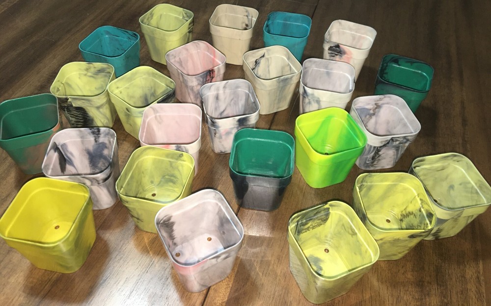 24 mid century seed starter pots 1960-80~marbled plastic multi colored 2"X2"