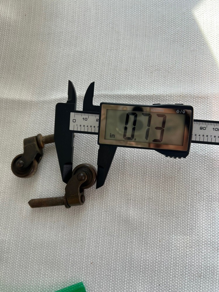 Two Antique Metal Casters