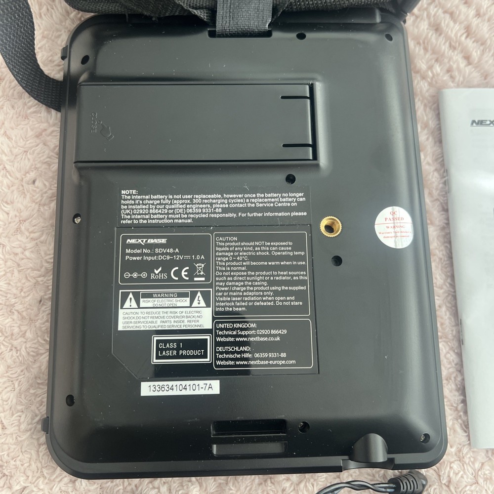 Next Base SDV48- A DVD Player, Power Supplies, Remote, Manual& Head Rest Strap.