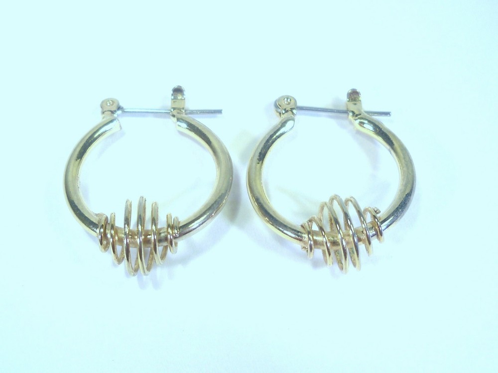 Gold Tone Earrings with a Coil Spring Design