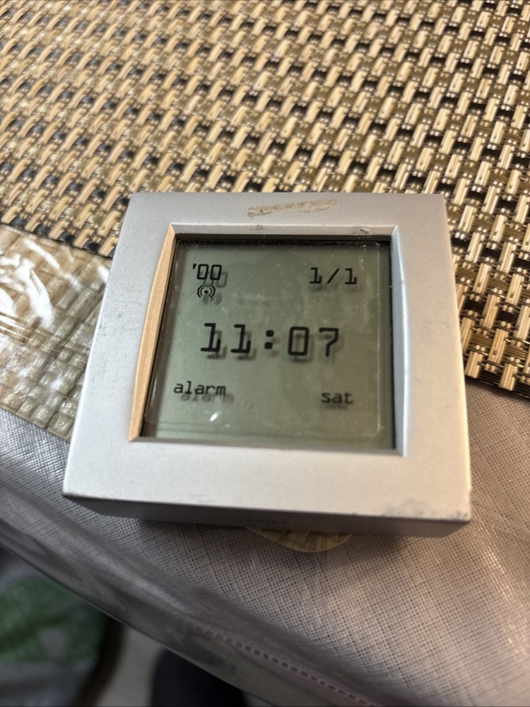 BROOKSTONE UPSIDE DOWN CLOCK ~ Date/Time, World Time, Timer, Temperature