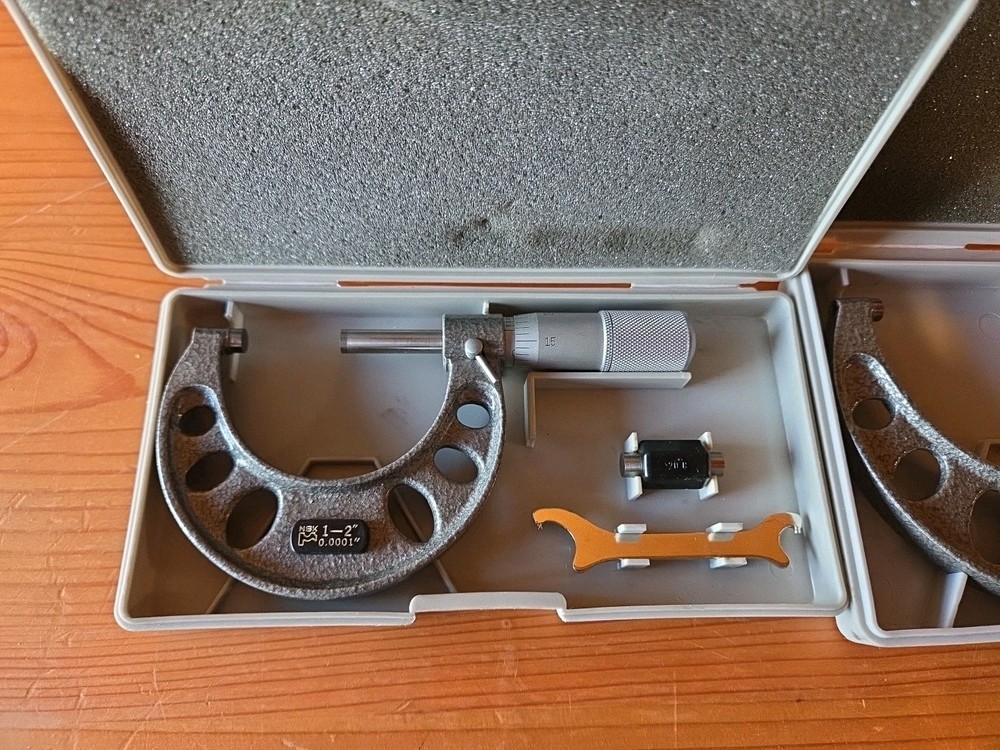 4 Micrometers And A Depth Gauge