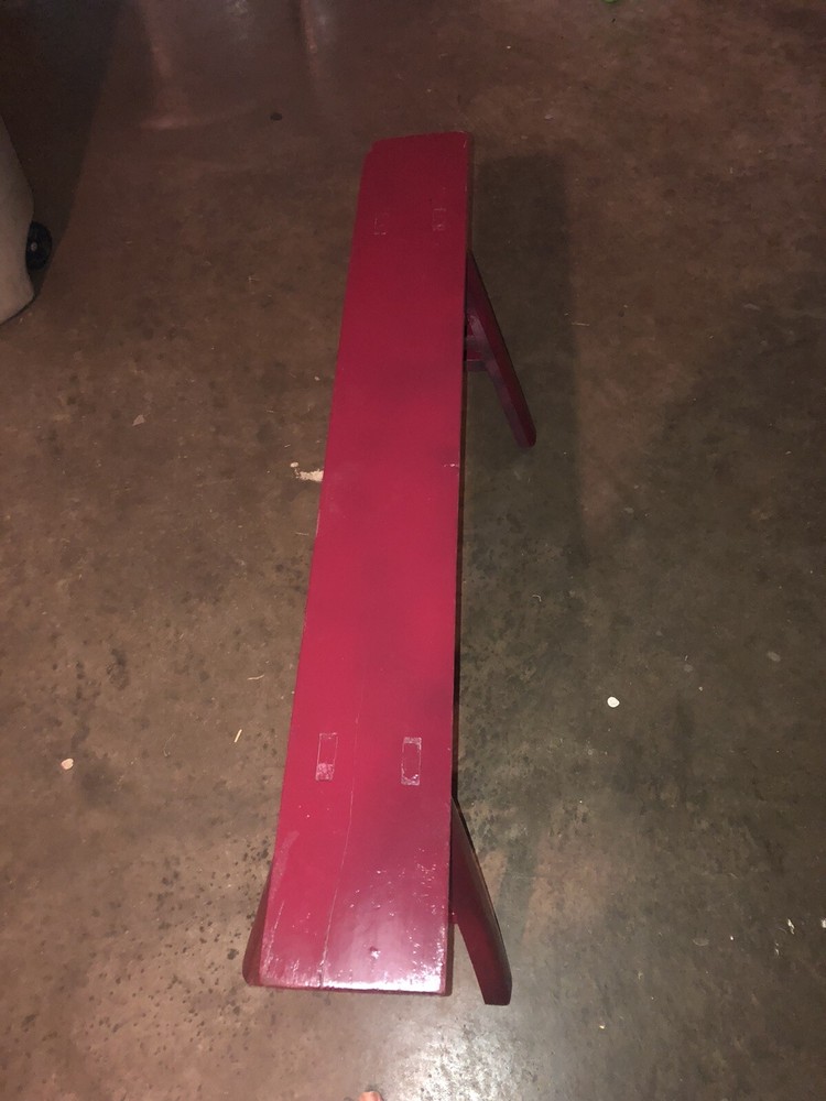 cranberry colored bench