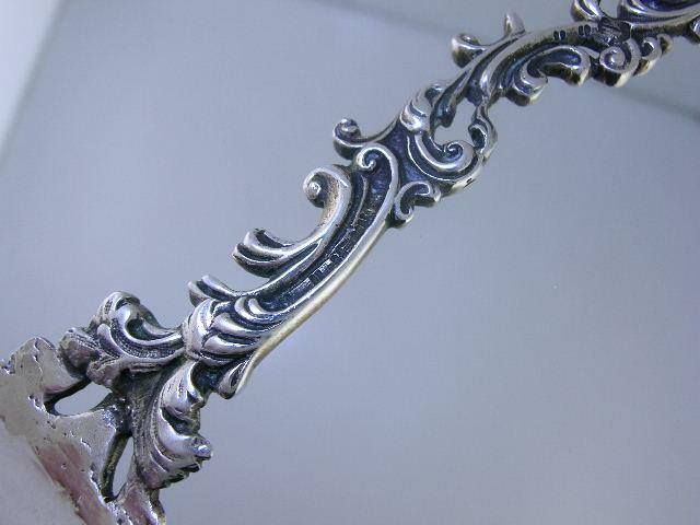 Old Dutch .833 Silver Figural Serving Spoon cherub / putti & scrolls c1895