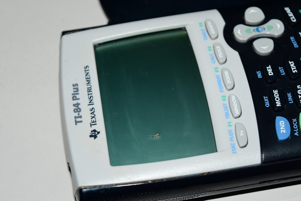Texas Instruments TI-84 Plus Graphics Calculator with spot on OUTER screen works
