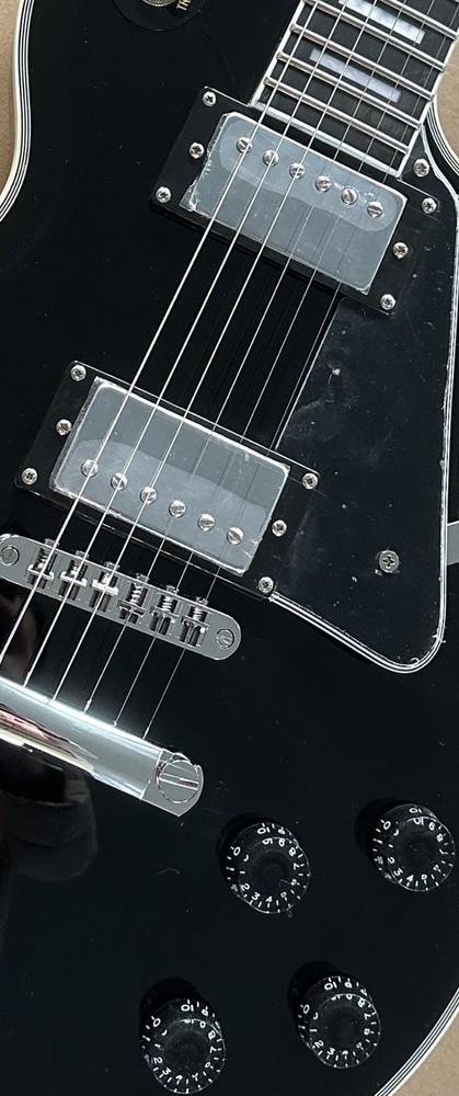 Customized electric guitar, black glossy, silver accessories, imported/from US