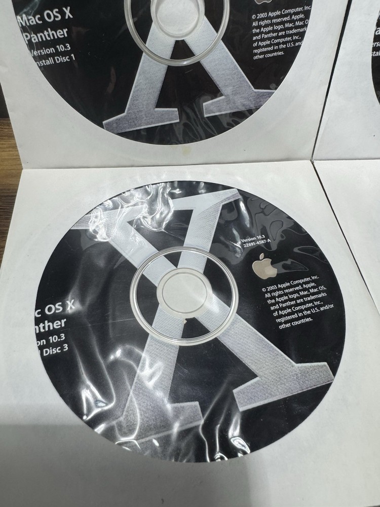 Apple Mac OS X Panther Version 10.3 Disc Set & Mac OS X Xcode Tools Version 1.0.