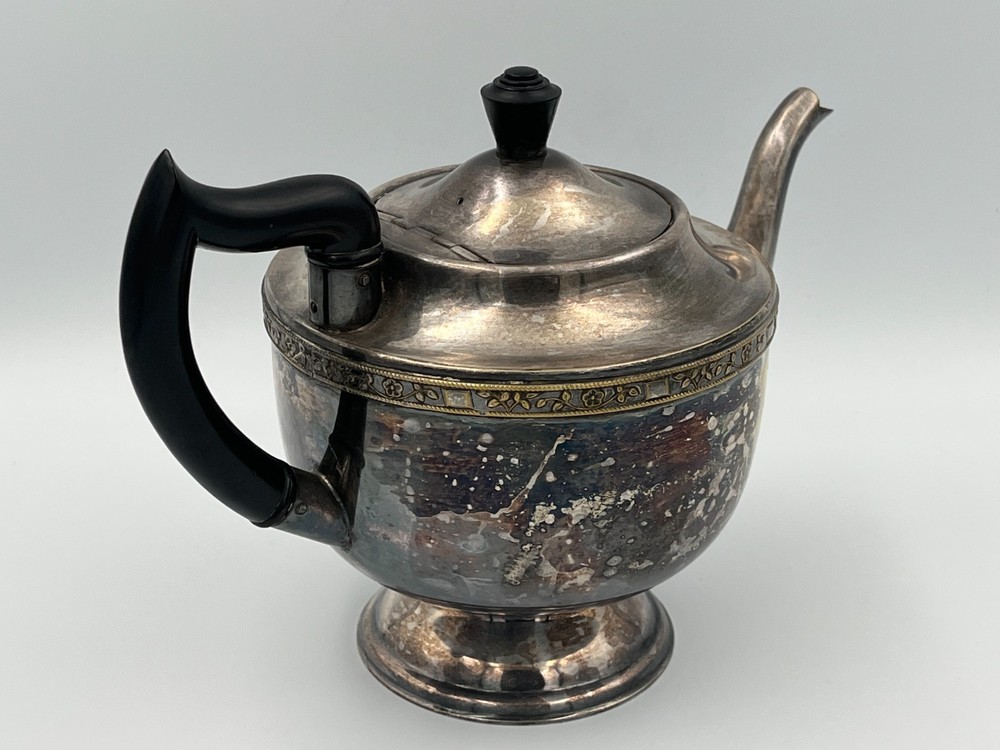 Antique silver plated teapot.
