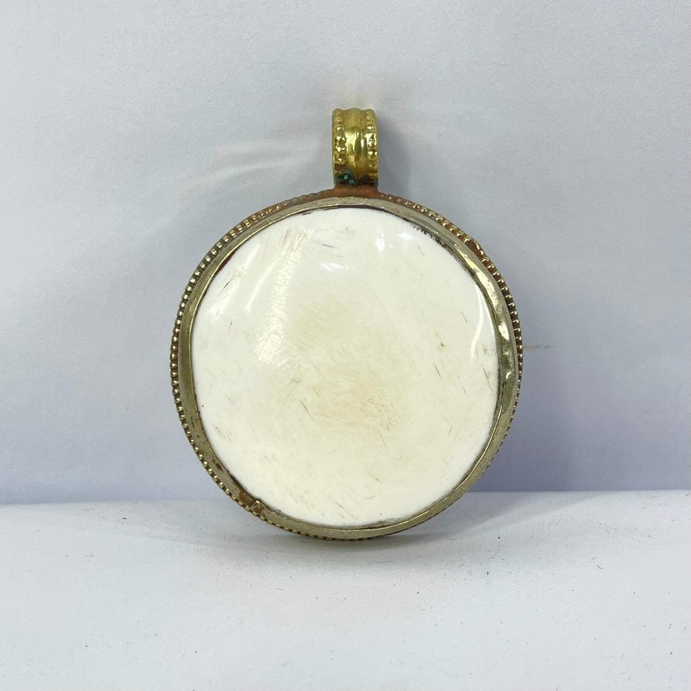 Tibetan Shell Repoussé Pendant