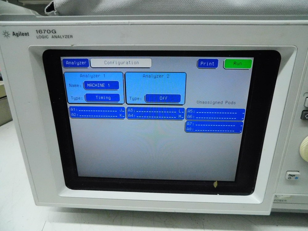 AGILENT 1670G LOGIC ANALYZER WITH CABLES. M7518