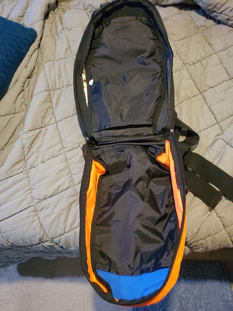 Ride Snowboards: Orange/Black Snowboarding heli-pack backpack
