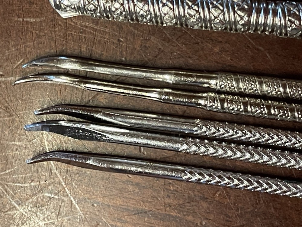 Vintage Handheld Metal Nutcracker w/ 4 picks