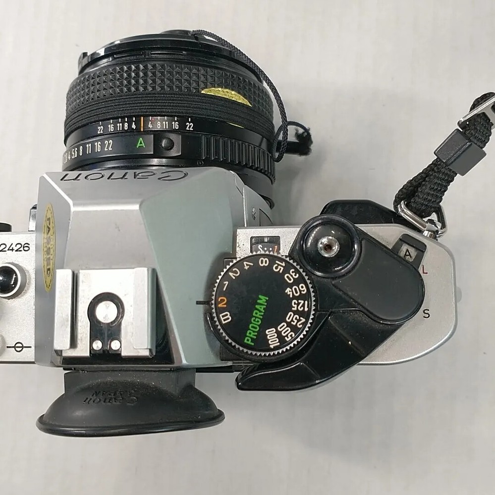 Canon AE-1 Program 35mm Camera Bundle With 50mm / 135 Lens Strap & Camera Bag