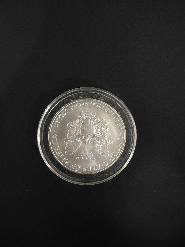 2003 Silver Dollar and coins
