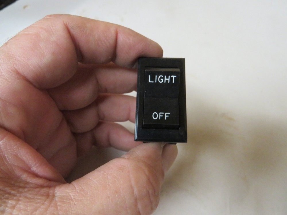 MONTAGUE - 23129-0 - LIGHT/OFF 4 TAB ROCKER SWITCH