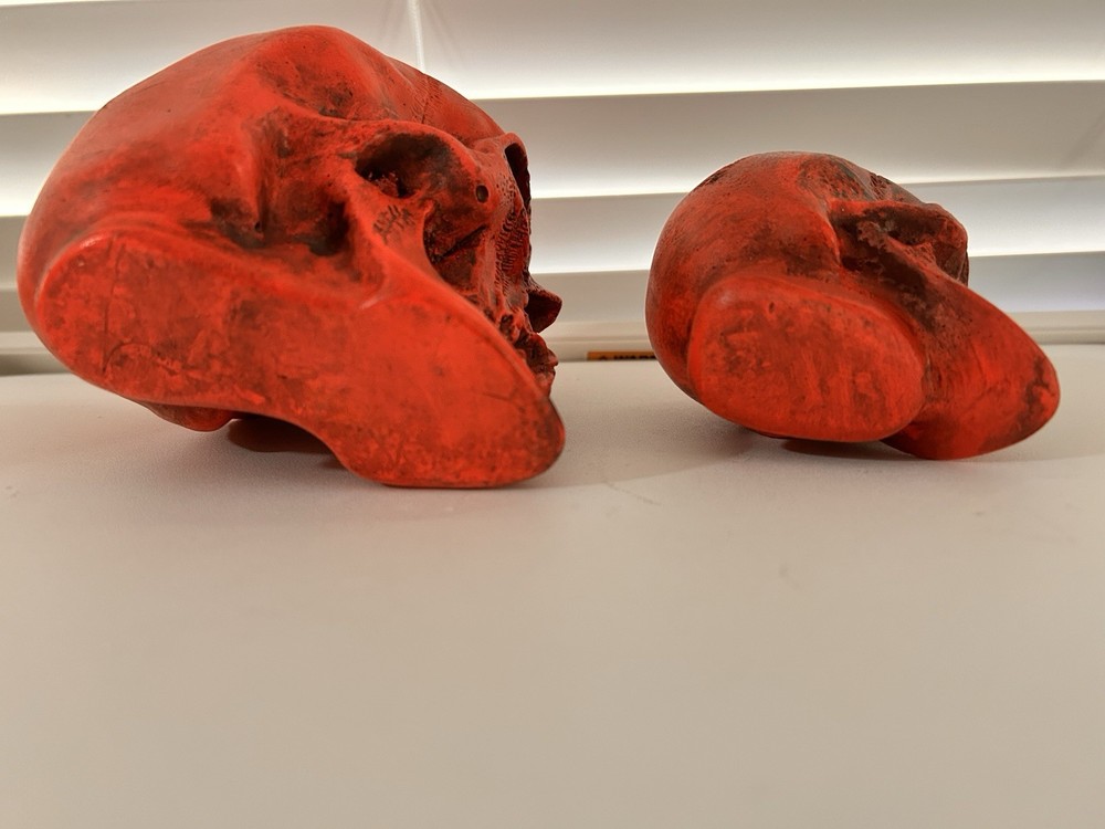 2 EA. RANDOTTI ORIGINAL LARGE & MEDIUM FLUORESCENT RED SKULLS STILL GLOW
