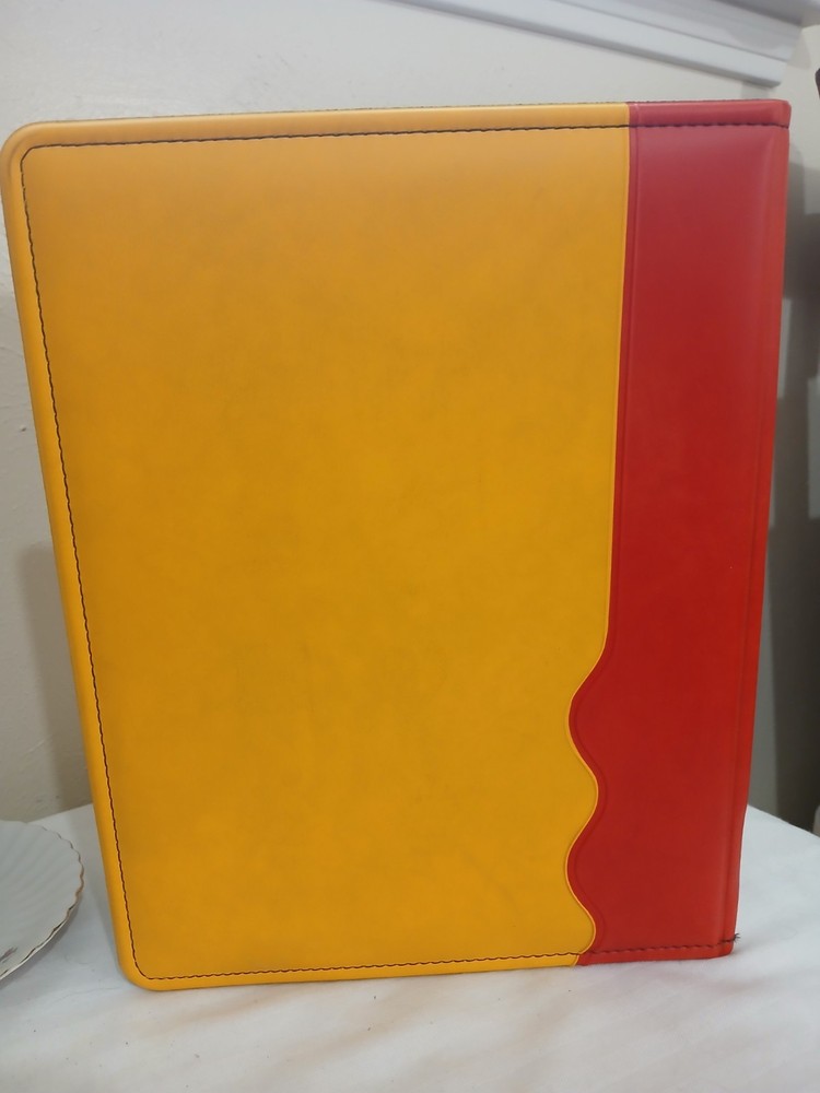 Decorative Binder featuring Historical Evolution Of the Shell Oil Logo