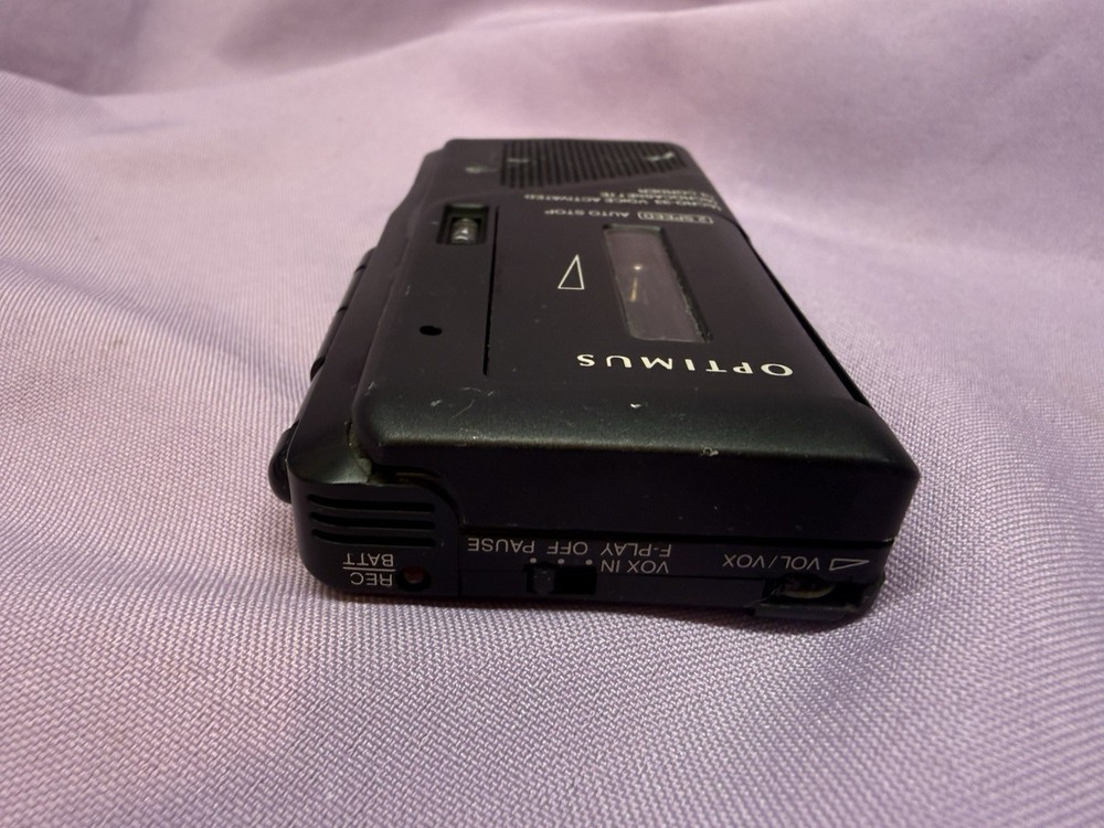 Optimus Micro-33 Voice Activated Microcassette Recorder. Not Tested.
