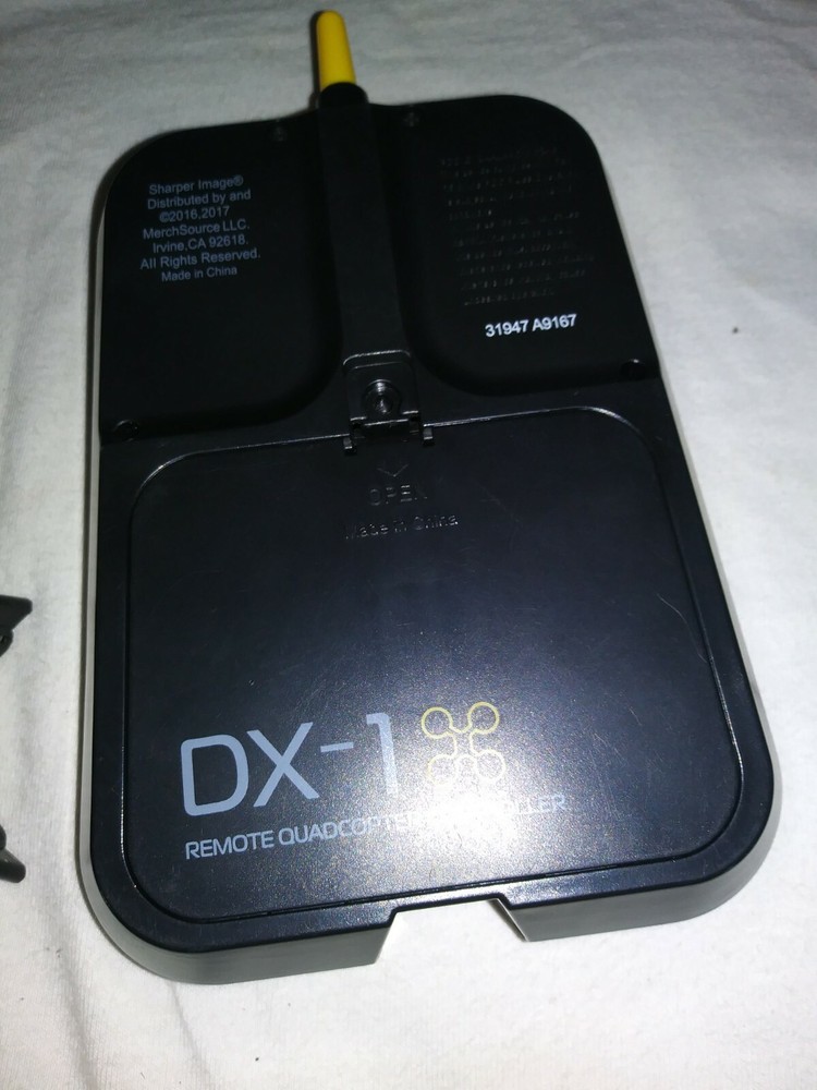 2 Sharper Image DX-1 Remotes Controllers Plus Micro Drone For Parts Not Tested