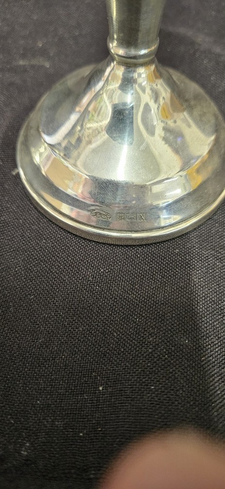 A Pair Of Antique Silver Candlesticks